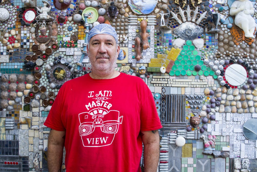 Satchel Raye, the owner of the pizza restaurant Satchel's, poses for a portrait. 