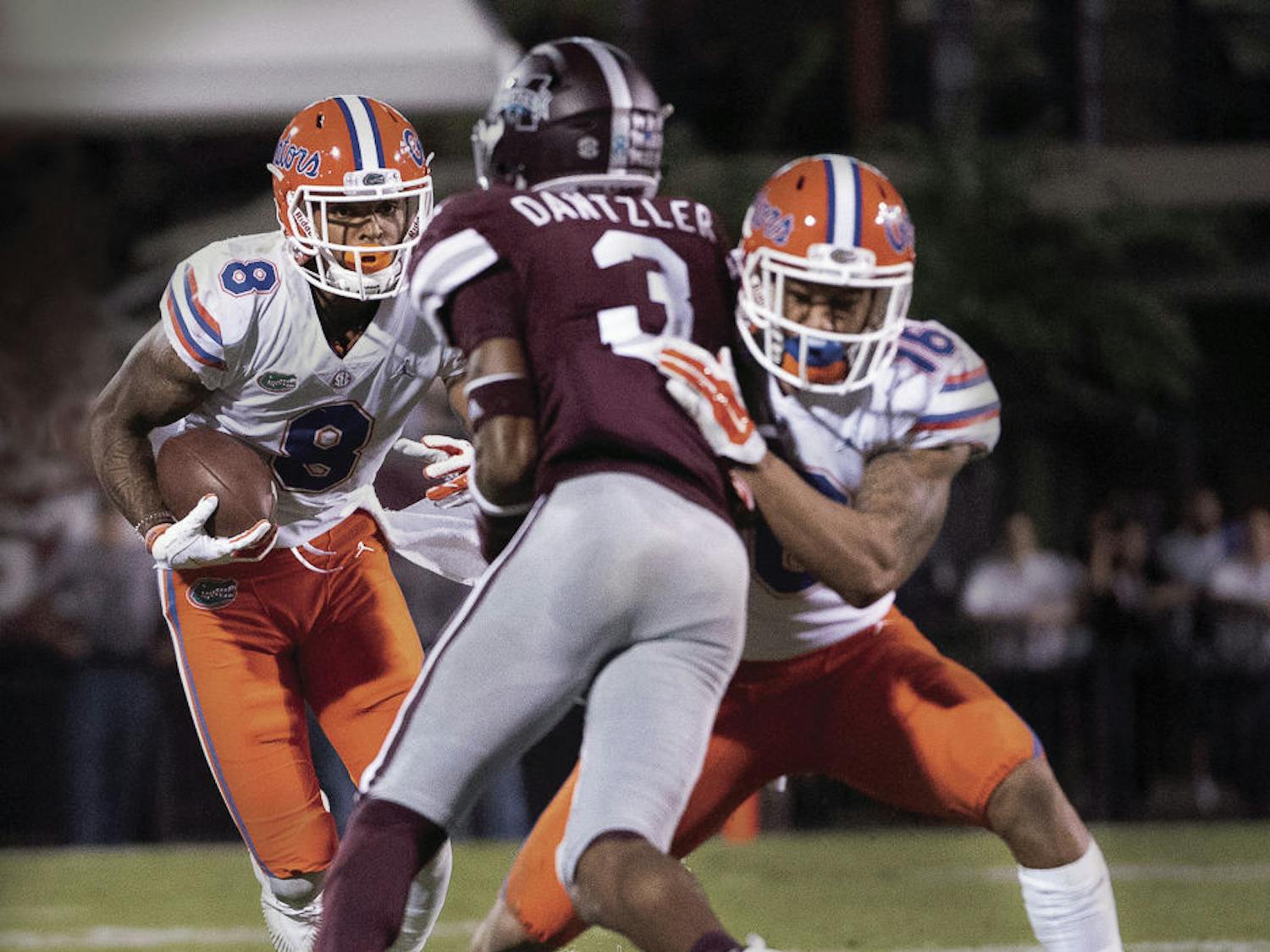 Wide receiver Trevon Grimes (8) is a former teammate of LSU quarterback Joe Burrow. "Before I left Ohio State, me and him were kind of close," he said.
