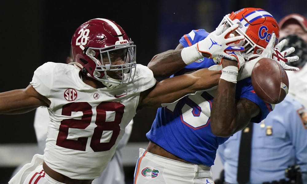 Alabama defensive back Josh Jobe (28) breaks up a pass intended for Florida wide receiver Jacob Copeland (15) during the second half of the Southeastern Conference championship game on Dec. 19, 2020 in Atlanta. (AP Photo/Brynn Anderson, File)