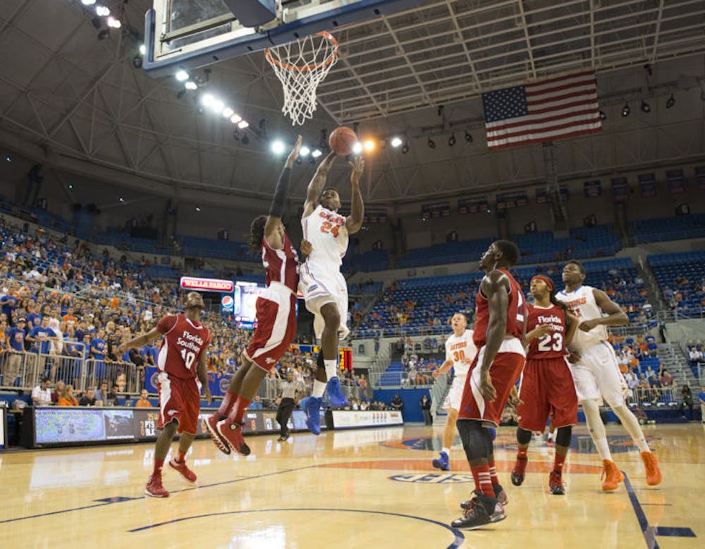 <p align="justify">Casey Prather drives down the lane during Florida’s 110-88 win against Florida Southern on Nov. 1, 2013, in the O’Connell Center. Prather has averaged a team-best 17.3 points per game this season.</p>