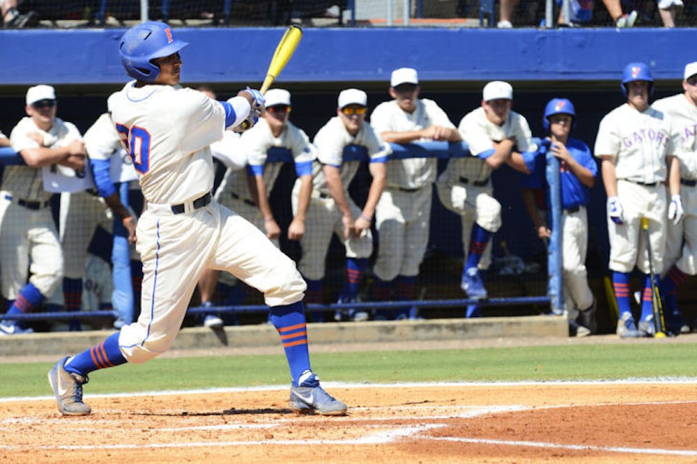 <p class="p1"><span class="s1">Senior Vickash Ramjit hits the ball during Florida’s 14-5 win against South Carolina on Saturday at McKethan Stadium. Ramjit scored three times in the victory, which completed the Gators’ first sweep against the Gamecocks since April 2009.</span></p>