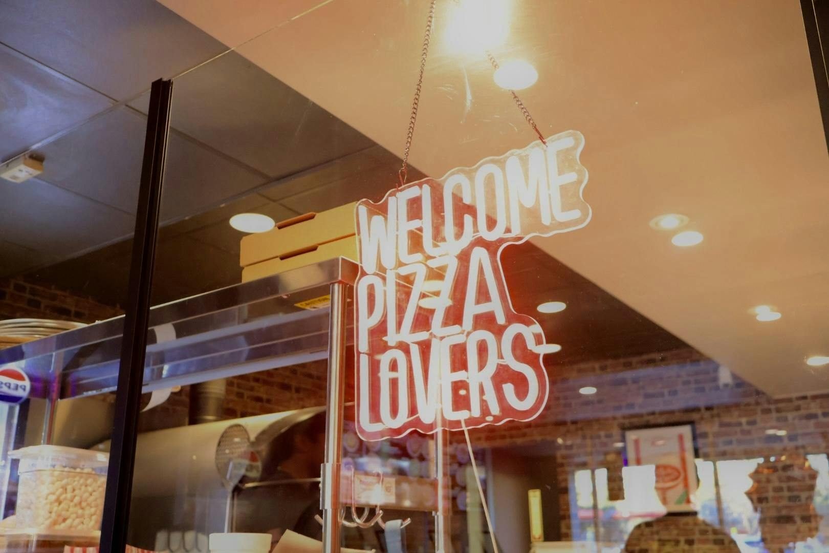 Bowie’s Pizza holds a grand opening celebration in Gainesville, Fla., Wednesday, Jan. 28, 2026. 