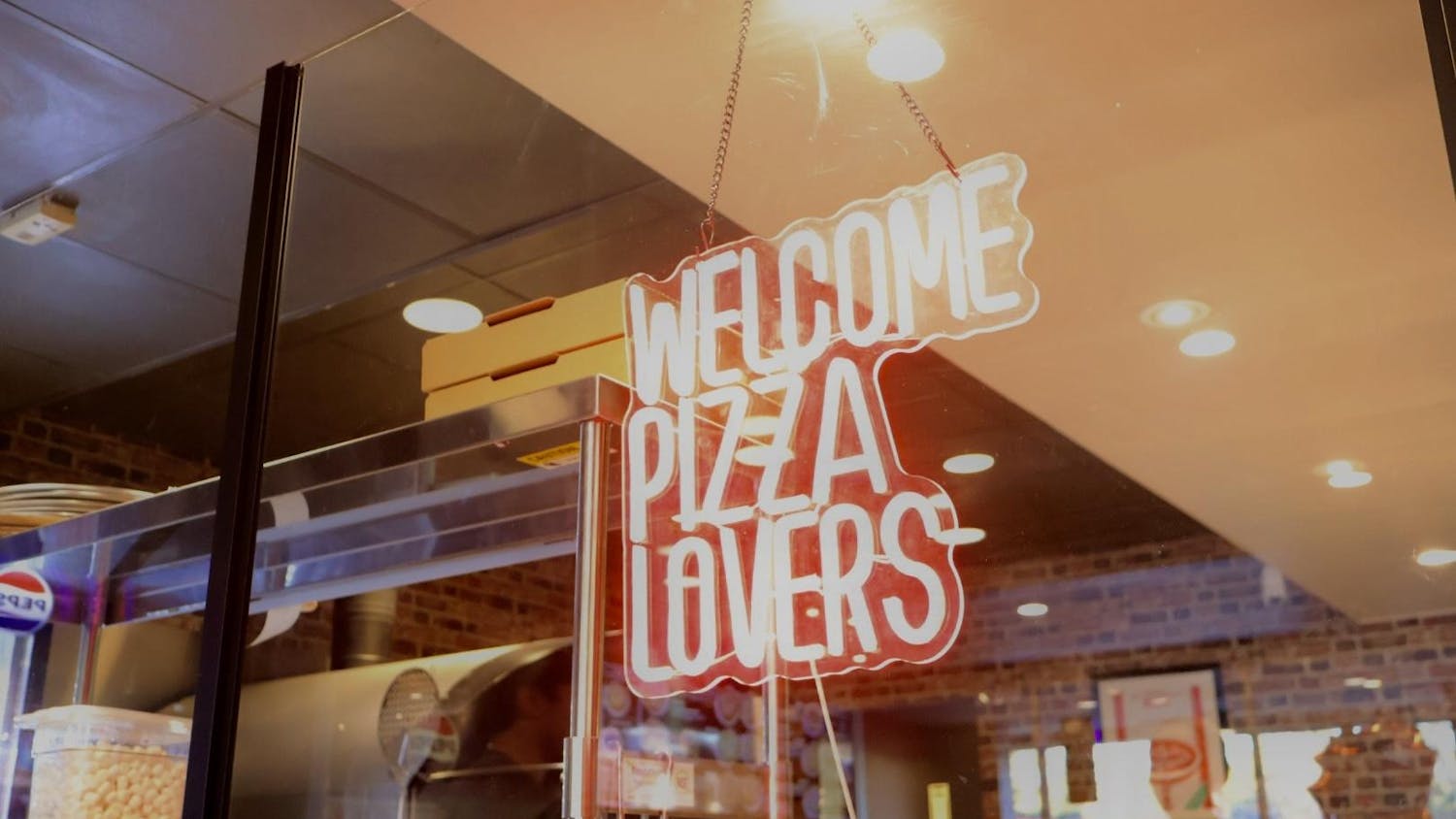 Bowie’s Pizza holds a grand opening celebration in Gainesville, Fla., Wednesday, Jan. 28, 2026.