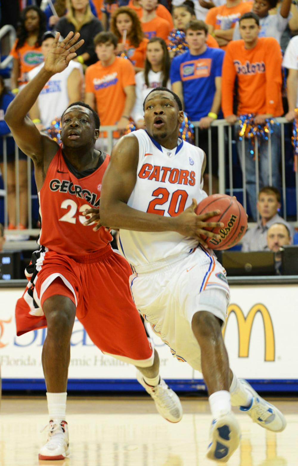 <p>Guard Michael Frazier II (20) drives down the baseline during Florida’s 77-44 win against Georgia on Jan. 9 in the O’Connell Center. </p>