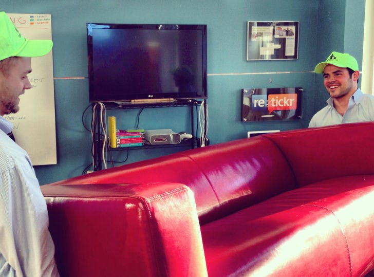 Bellhops student movers Weston Wamp, right, and Jared Houghton carry a couch as part of their moving service in Chattanooga, Tenn. Bellhops is run completely via a web application.