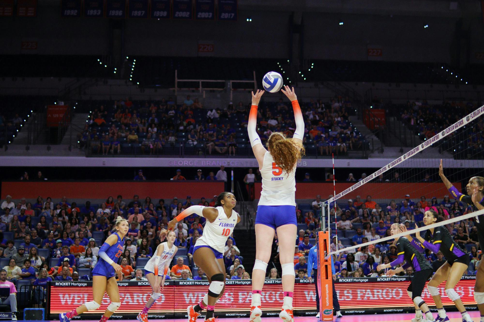 Freshman setter Alexis Stucky sets up middle blocker Gabrielle Essix during Florida's match with LSU Saturday, Oct. 8, 2022. 