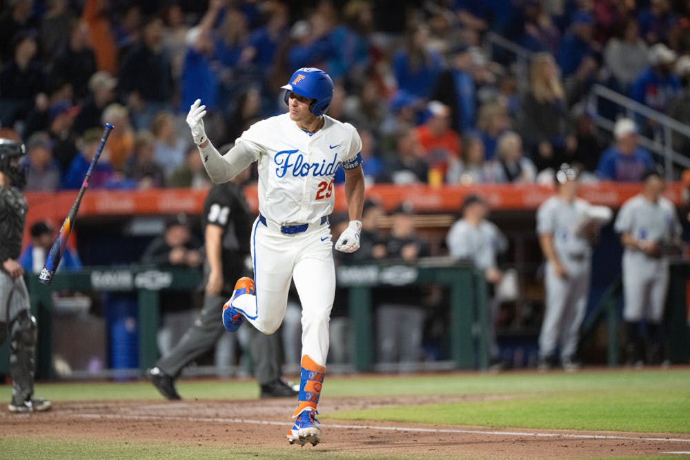 Florida Gators catcher Brody Donay (29) flips his bat after hitting the first home run of the season in a baseball game against the Air Force Academy in Gainesville, Fla., on Friday, Feb. 14, 2025.