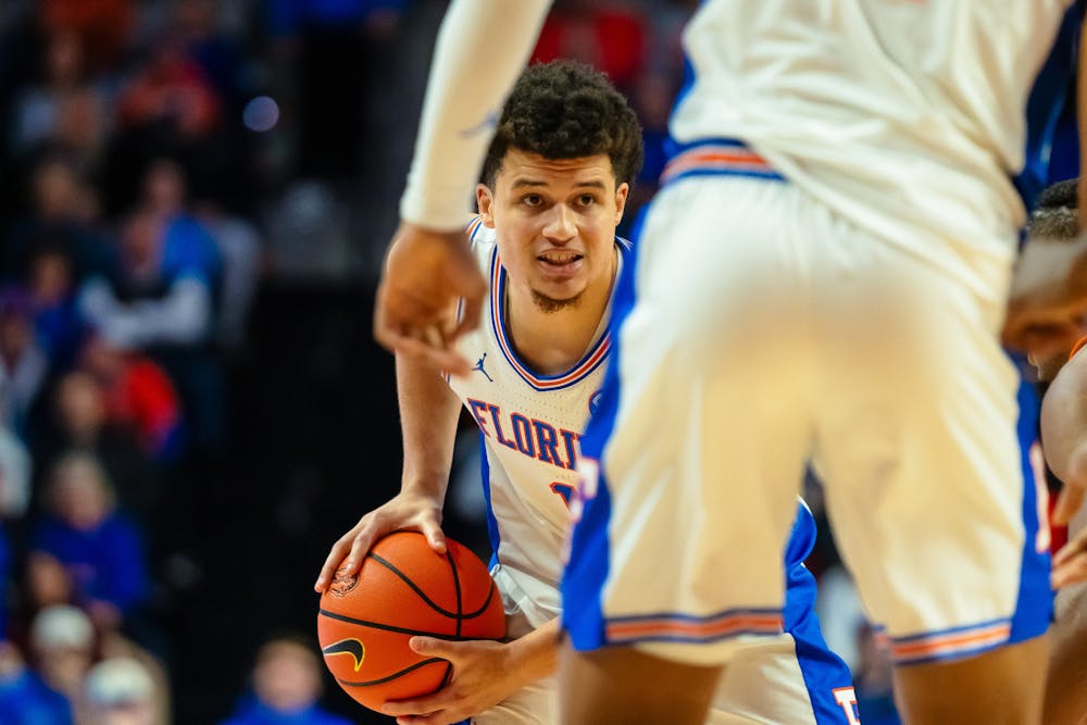 <p>UF basketball player Walter Clayton Jr. (1) looks toward his teammate during the game against the Tennessee Volunteers on Jan. 7, 2025.</p>