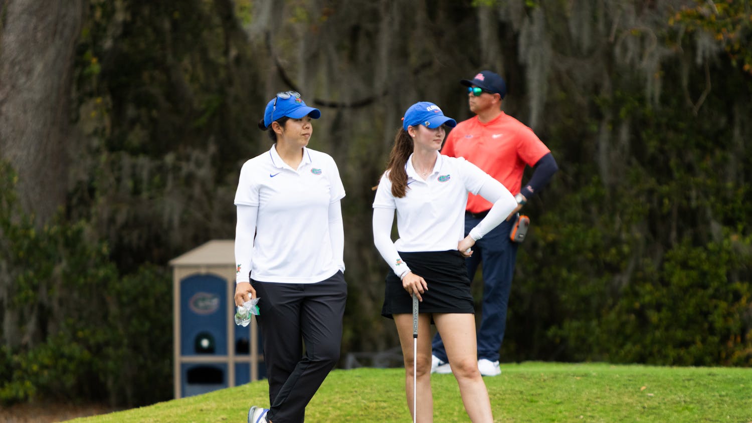 Gators women's senior golfer Maisie Filler and assistant coach Beth Wu look on at the Gators Invitational on Friday, March 1, 2024. 