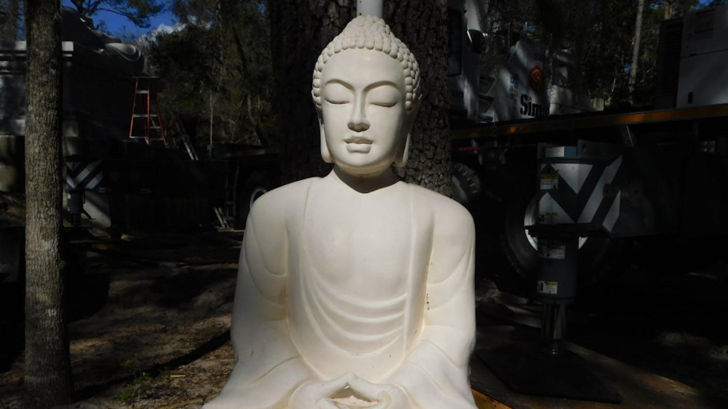 The smaller sitting Buddha weighs 66,138.7 pounds. 