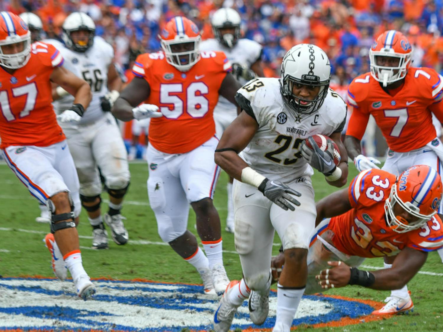 Linebacker David Reese (33) and the Gators defense will have their hands full dealing with Vanderbilt running backs Khari Blasingame (23) and Ke'Shawn Vaughn this Saturday.