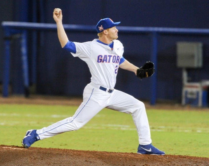 Ryan Harris pitches the ball during Florida’s 4-0 win against Maryland on Feb. 14 at McKethan Stadium. Harris has notched a 0.79 ERA in nine appearances in the Gators’ first 16 games.