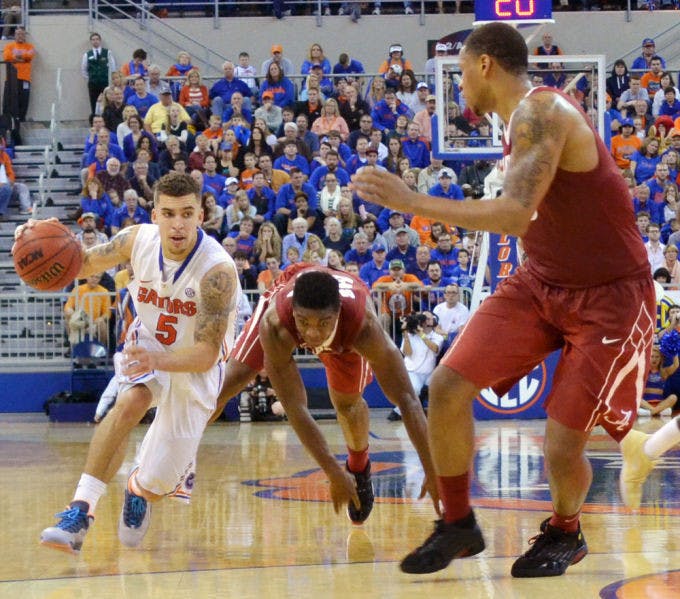 Scottie Wilbekin drives the ball down the court in Florida’s 78-69 win against Alabama on Saturday in the O’Connell Center. On Tuesday, Wilbekin scored a team-high 21 points on 5-of-17 shooting against Tennessee, leading his team to only its second win in its last nine meetings in the Thompson-Boling Arena.