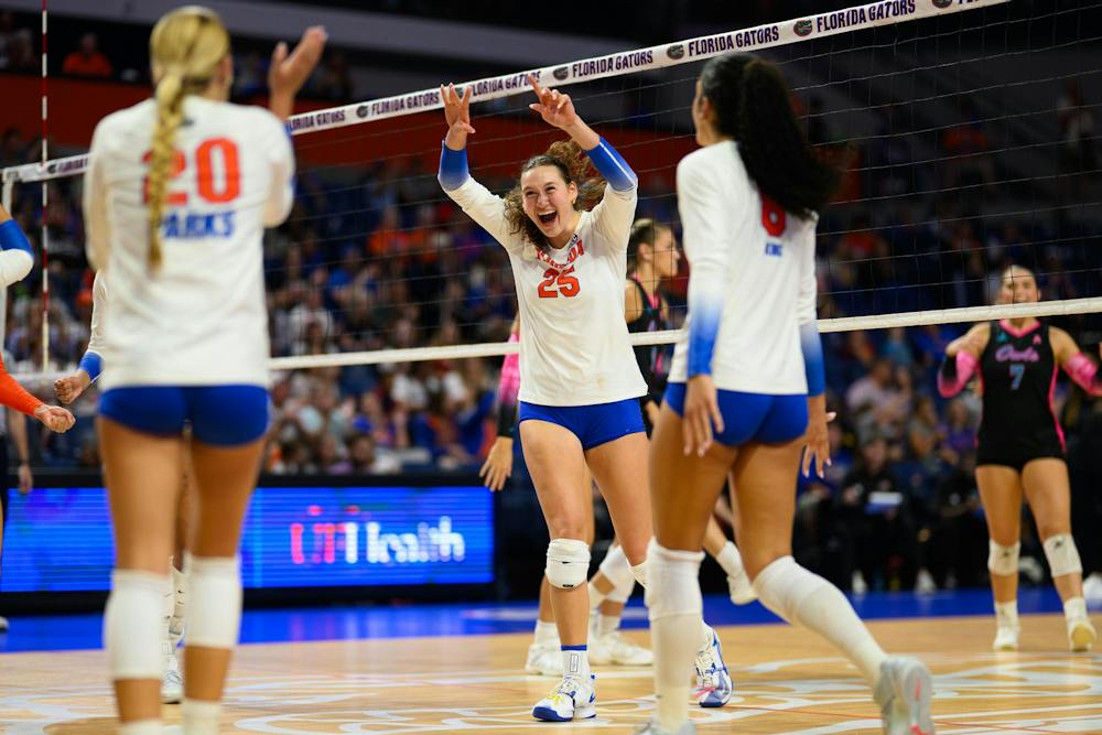 Florida middle blocker Alec Rothe (25) celebrates winning a point during an NCAA Volleyball match against FAU, Friday, Sept. 11, 2026, in Gainesville, Fla.