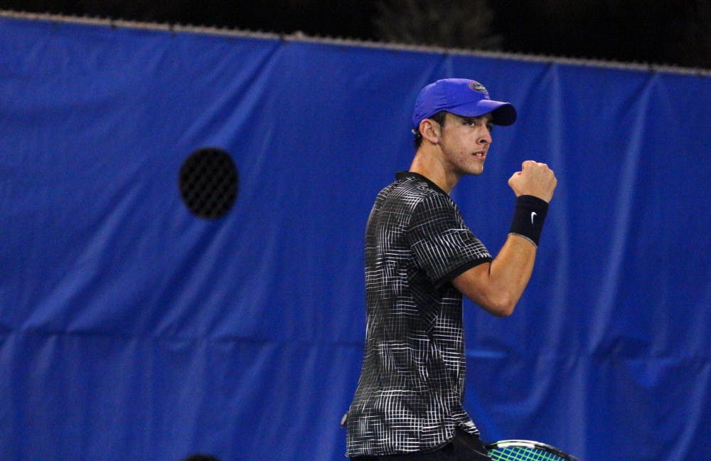 <p>Senior Chase Perez-Blanco helped the Gators win the doubles point and took a singles point as well in a fiery matchup Friday night against Georgia. </p>