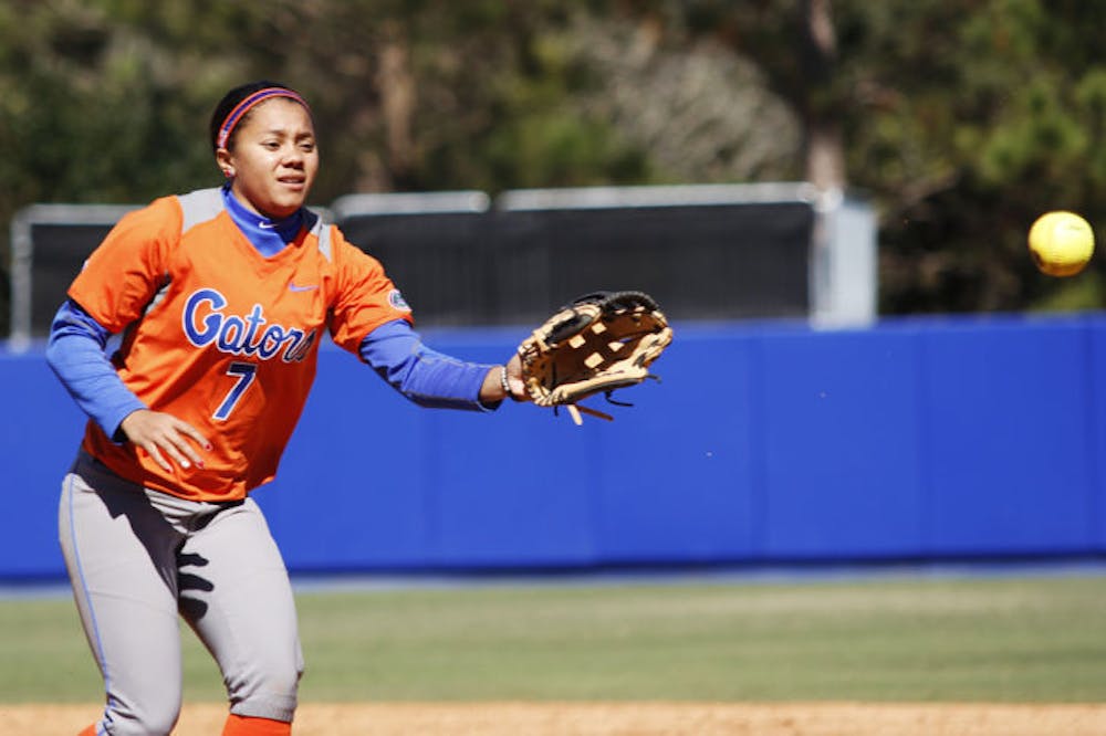 <p align="justify">Second baseman Kelsey Stewart (7) catches a ball during warmups between innings in Florida’s 9-1 win against UNC Wilmington on Feb. 17 at Katie Seashole Pressly Stadium.</p>