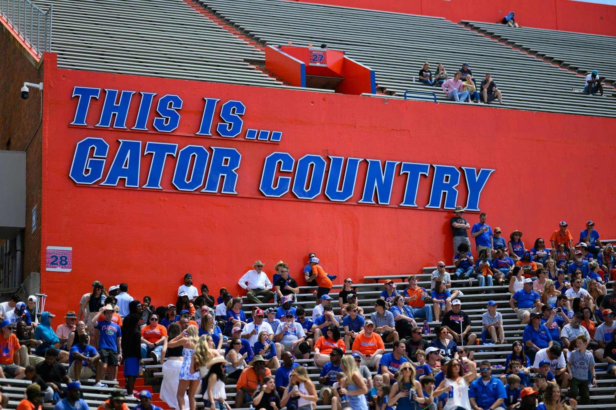 A sign reads “This is… Gator Country” inside Ben Hill Griffin Stadium.