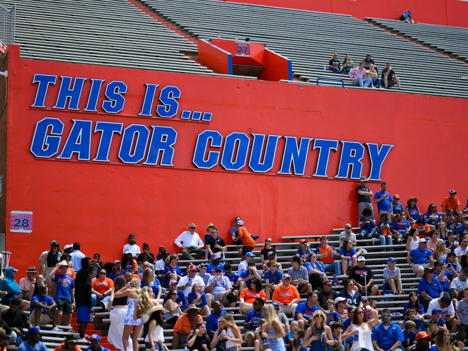 A sign reads “This is… Gator Country” inside Ben Hill Griffin Stadium.