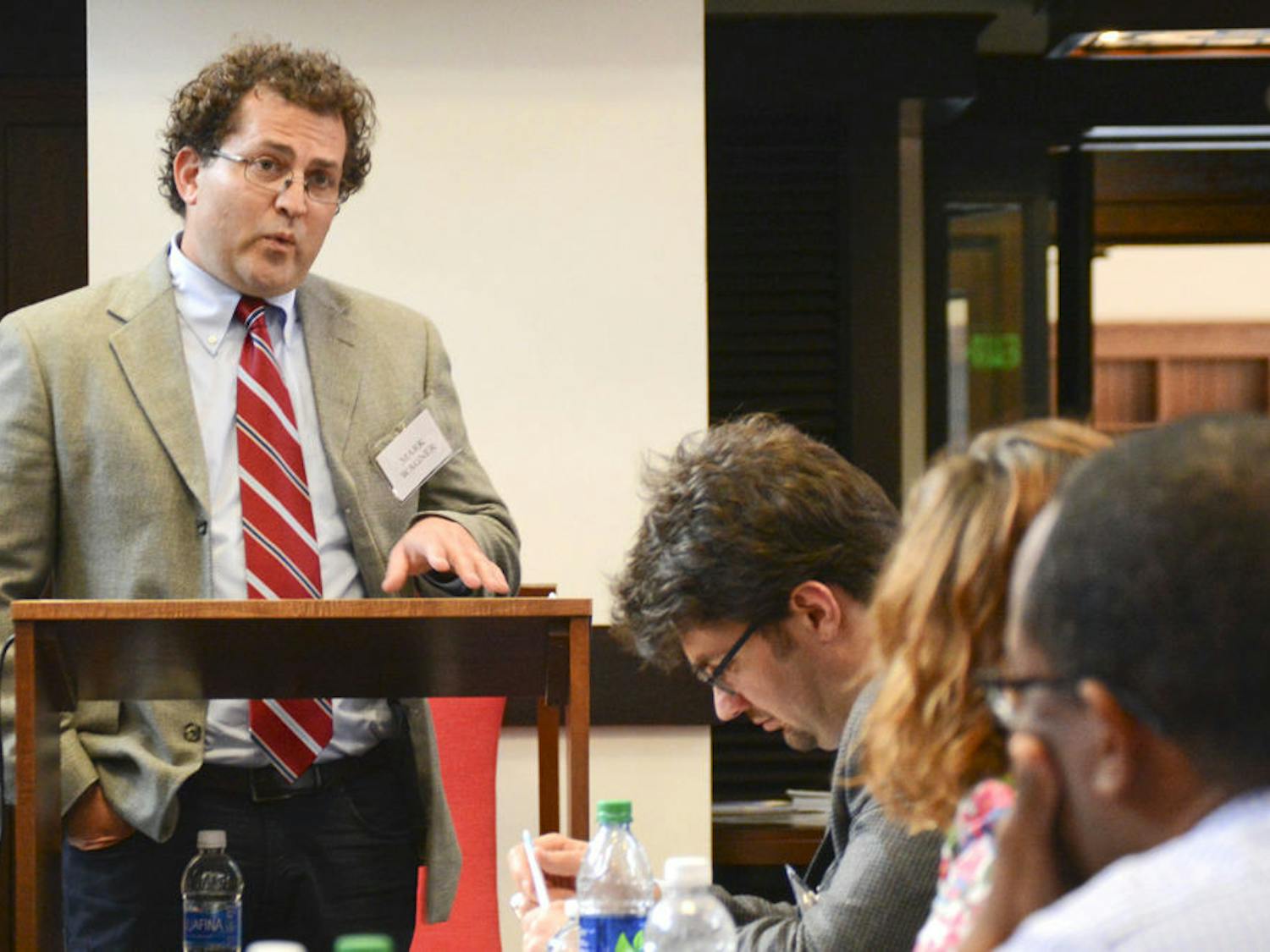 Mark Wagner, an associate professor of foreign language and literature at Louisiana State University, answers a question in the Judaica Suite of the Smathers Library on Wednesday during the Q&A portion of his talk, “Sexual liaisons between Muslims and Jews in 20th century Yemen.” Wagner was one of several scholars invited by the Center for Global Islamic Studies and the Center for Jewish Studies for a conference discussing the history of Muslim-Jewish relationships.