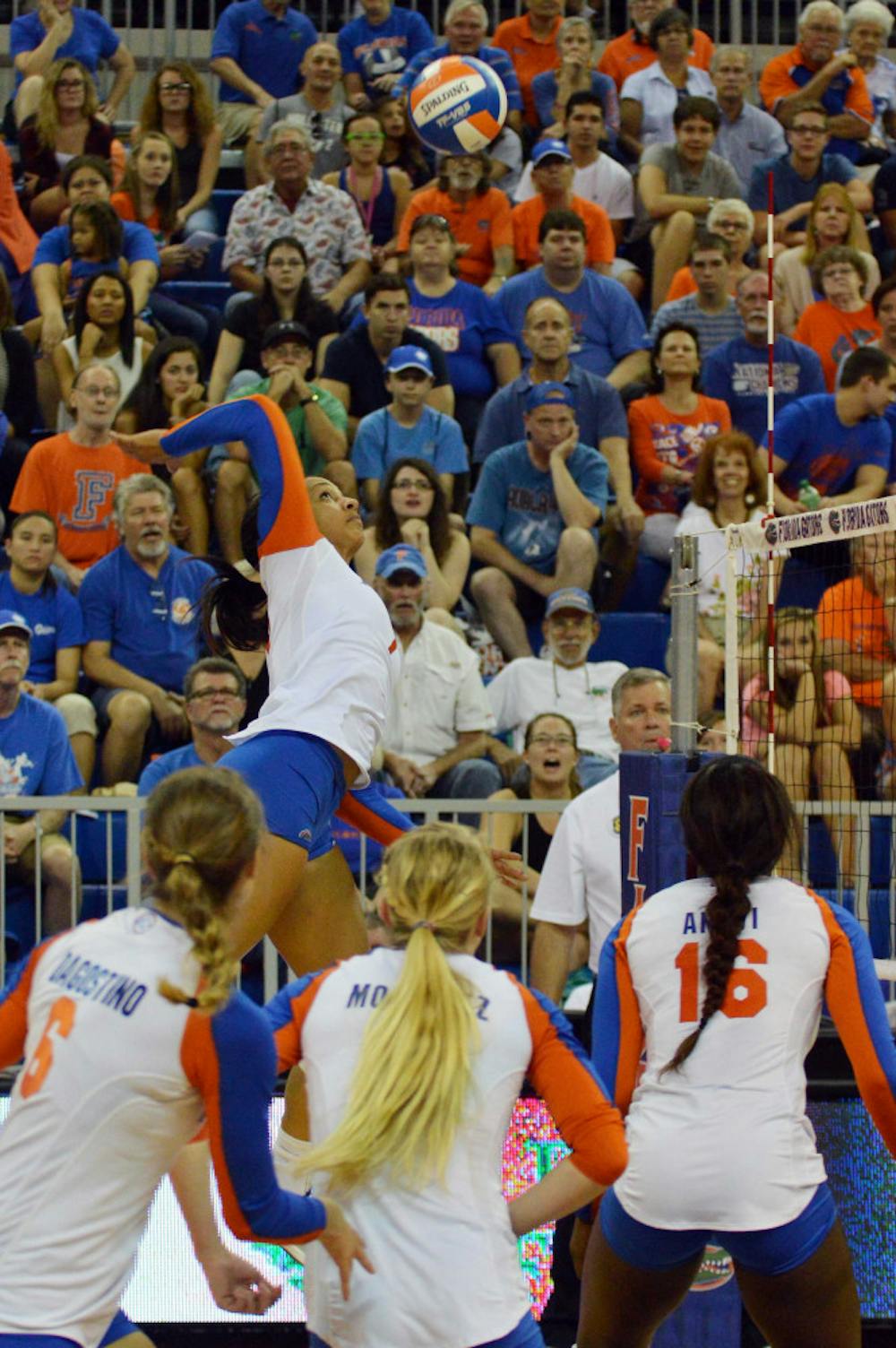 <p>Gabby Mallette swings for a kill attempt during Florida's 3-0 win against Georgia on Friday in the O'Connell Center</p>