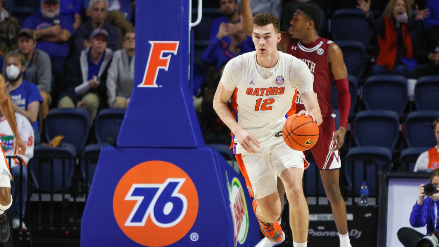 Florida forward Colin Castleton dribbles the ball down the court in the Gators' 81-60 victory against the South Carolina Gamecocks Wednesday, Jan. 25, 2023.