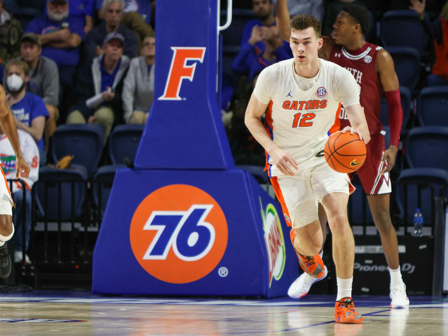 Florida forward Colin Castleton dribbles the ball down the court in the Gators' 81-60 victory against the South Carolina Gamecocks Wednesday, Jan. 25, 2023.