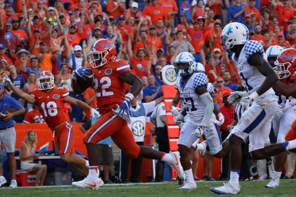 Lamical Perine (22) runs toward the endzone during Florida's 45-7 win over Kentucky on Sept. 10, 2016, at Ben Hill Griffin Stadium.