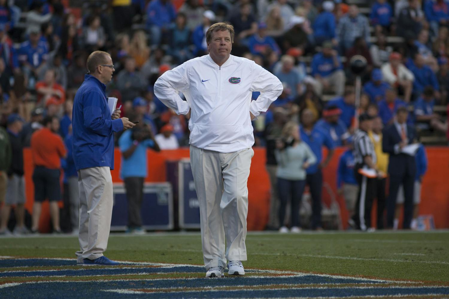 UF coach Jim McElwain watches on during UF's Orange and Blue Debut on April 7, 2017, at Ben Hill Griffin Stadium.