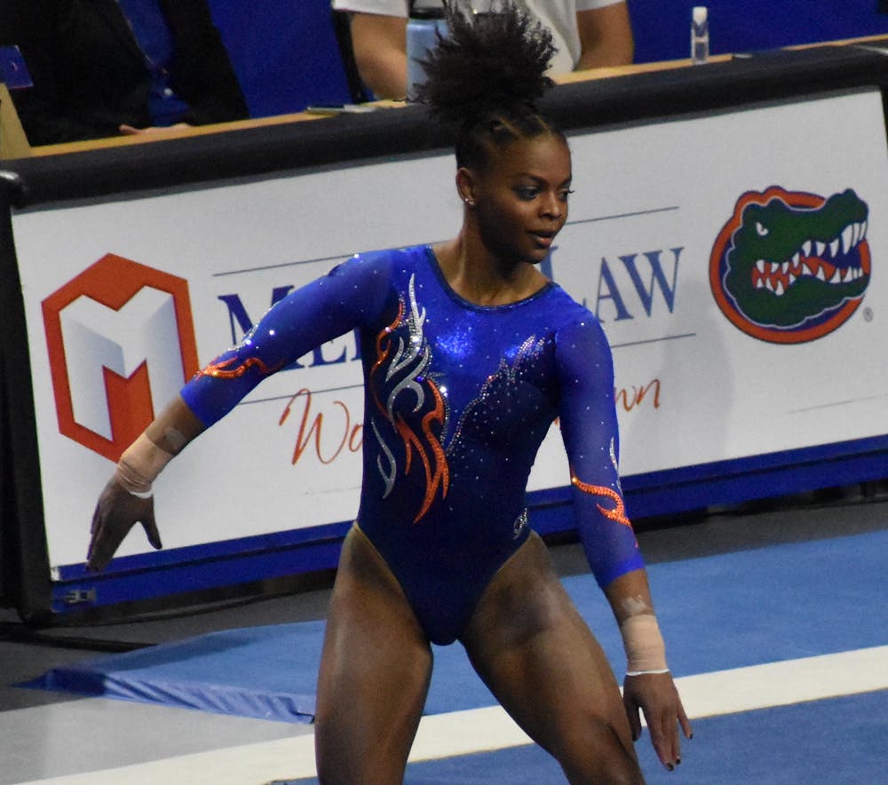 Star gymnast Trinity Thomas may perform in the bars lineup in the upcoming NCAA Regionals. Photo from UF-Mizzou meet Jan. 29.