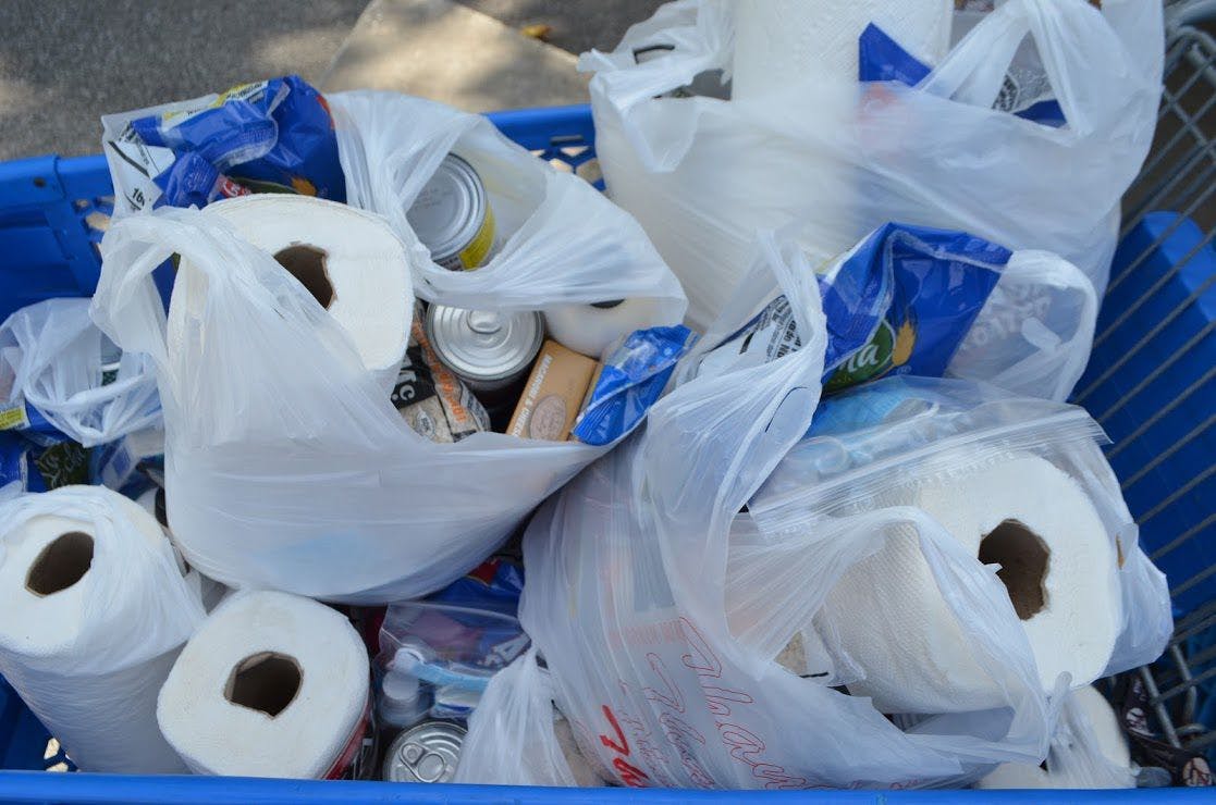 Supplies await distribution at the Gainesville chapter of the Salvation Army's food drive event Wednesday.&nbsp;