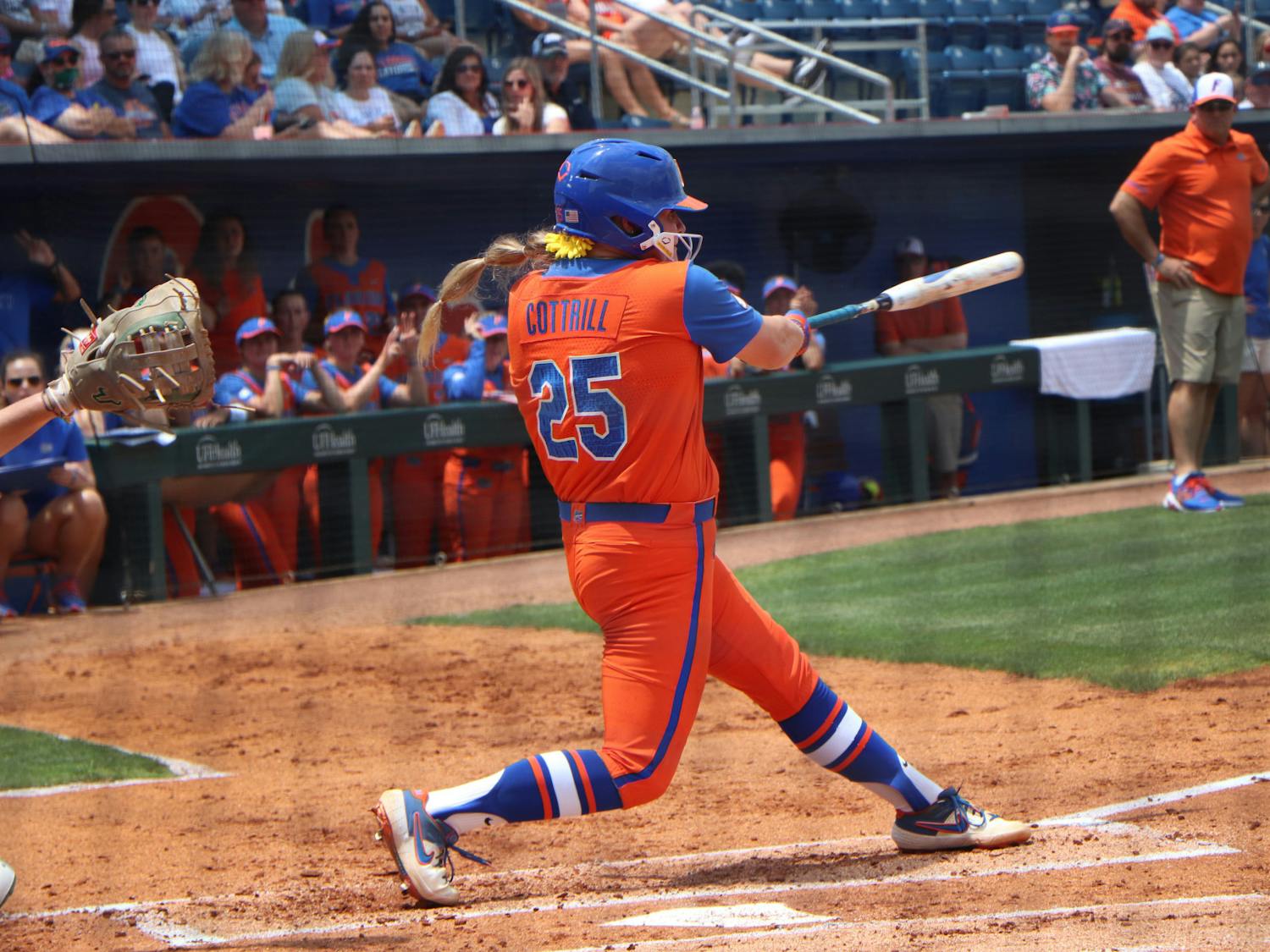 Julia Cottrill swings Friday against USF. Cottrill helped lead the Gators to an 8-0 win over the Bulls Sunday.
