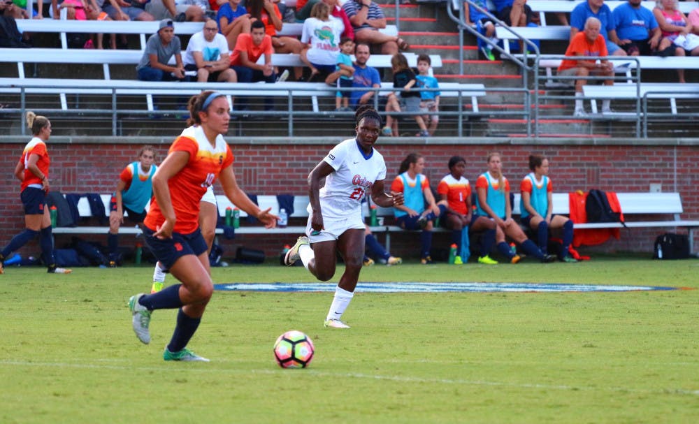 Deanne Rose chases a Syracuse player with possession of the ball during Florida's 2-1 win against the Orange on Aug. 27 at Donald R. Dizney Stadium.
