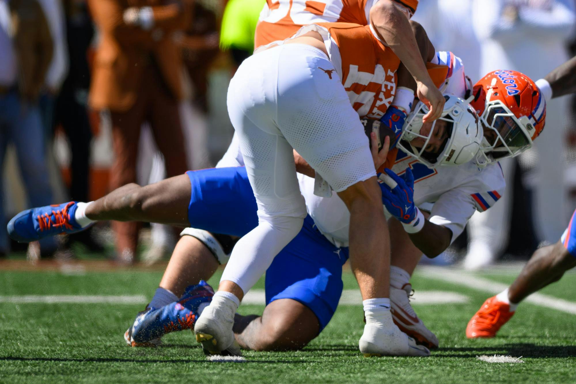 Florida defensive lineman LJ McCray (11) sacks Texas quarterback Arch Manning (16) during the second half of an NCAA college football game, Saturday, Oct. 17, 2026, in Austin, Texas.