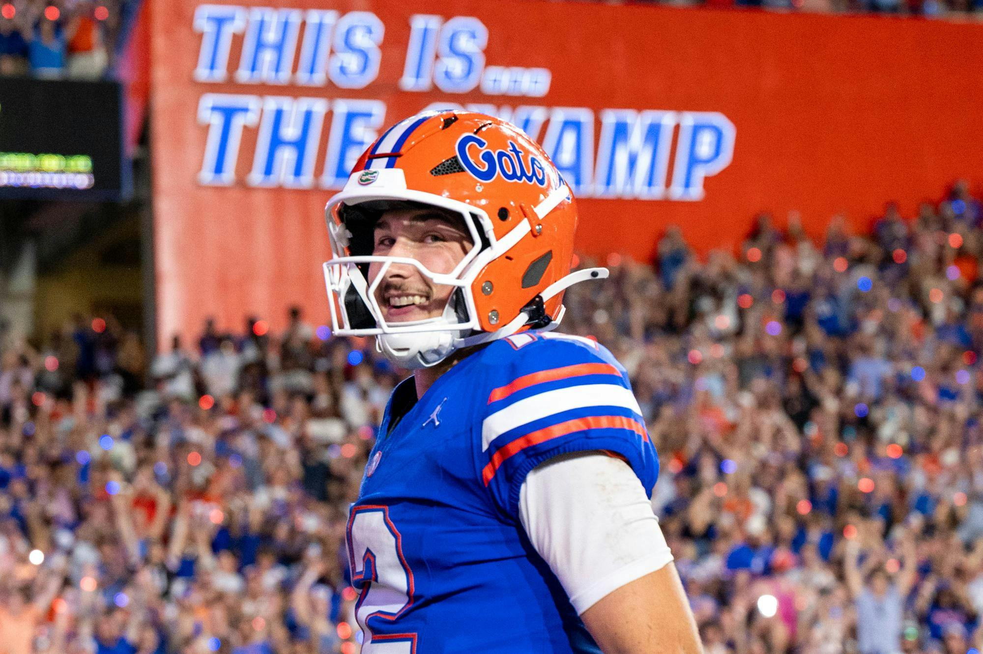 Florida quarterback Aaron Philo (12) smiles after making a touchdown during the first half of an NCAA college football game against FAU, Saturday, Sept. 5, 2026, in Gainesville, Fla.
