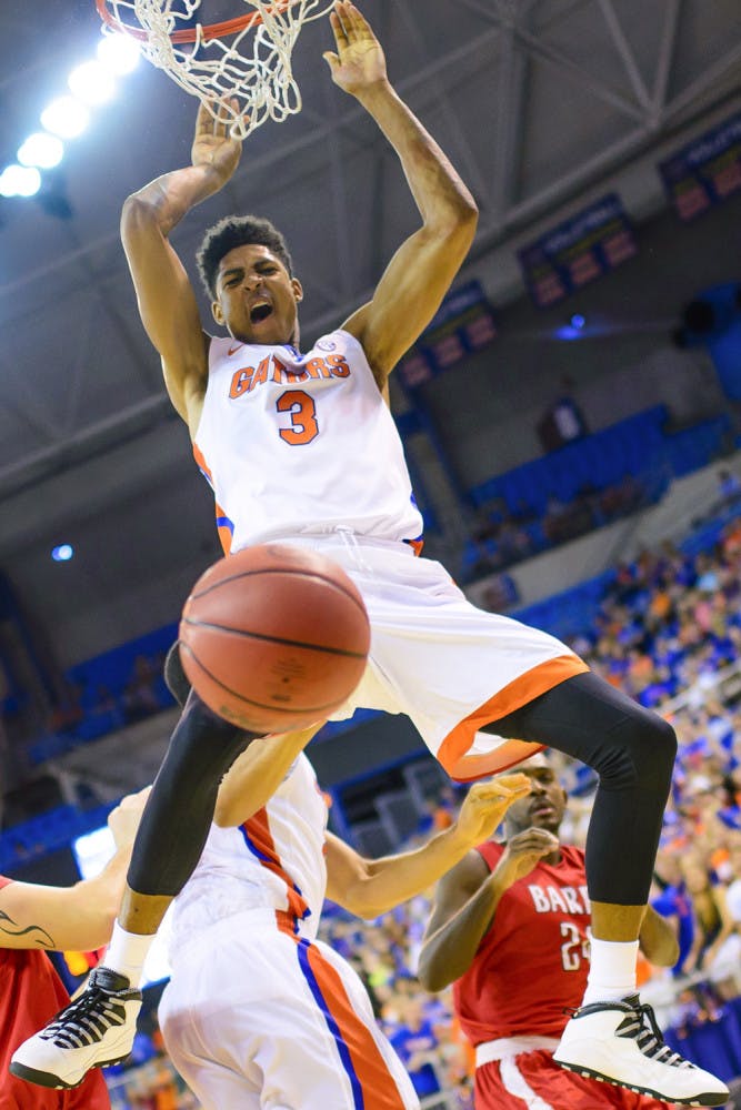 Devin Robinson dunks during Florida's 79-70 exhibition win against Barry