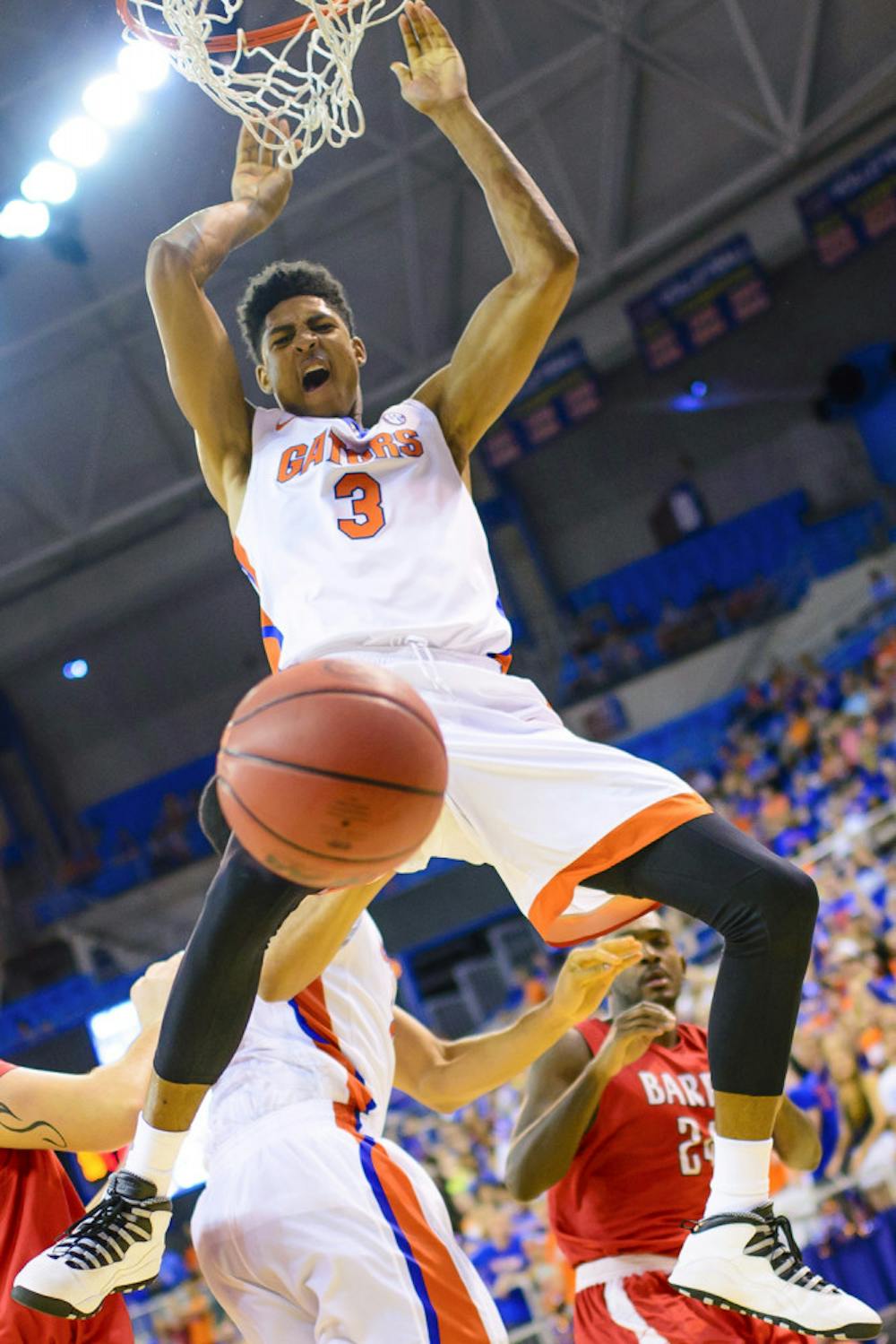 <p>Devin Robinson dunks during Florida's 79-70 exhibition win against Barry</p>