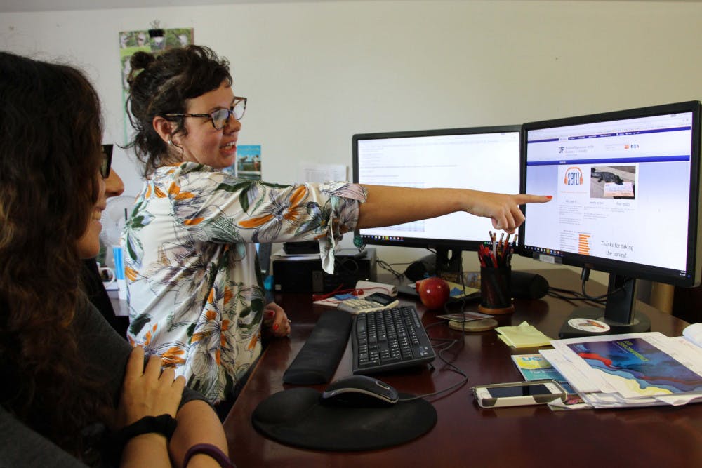 <p><span>Irina Javaheri, left, a data analyst for the Office of Institutional Planning and Research. Noelle Mecoli, right, Associate Director of Analytic Services for the Office of Institutional Planning and Research. They’re both viewing SERU response rates.</span></p>
