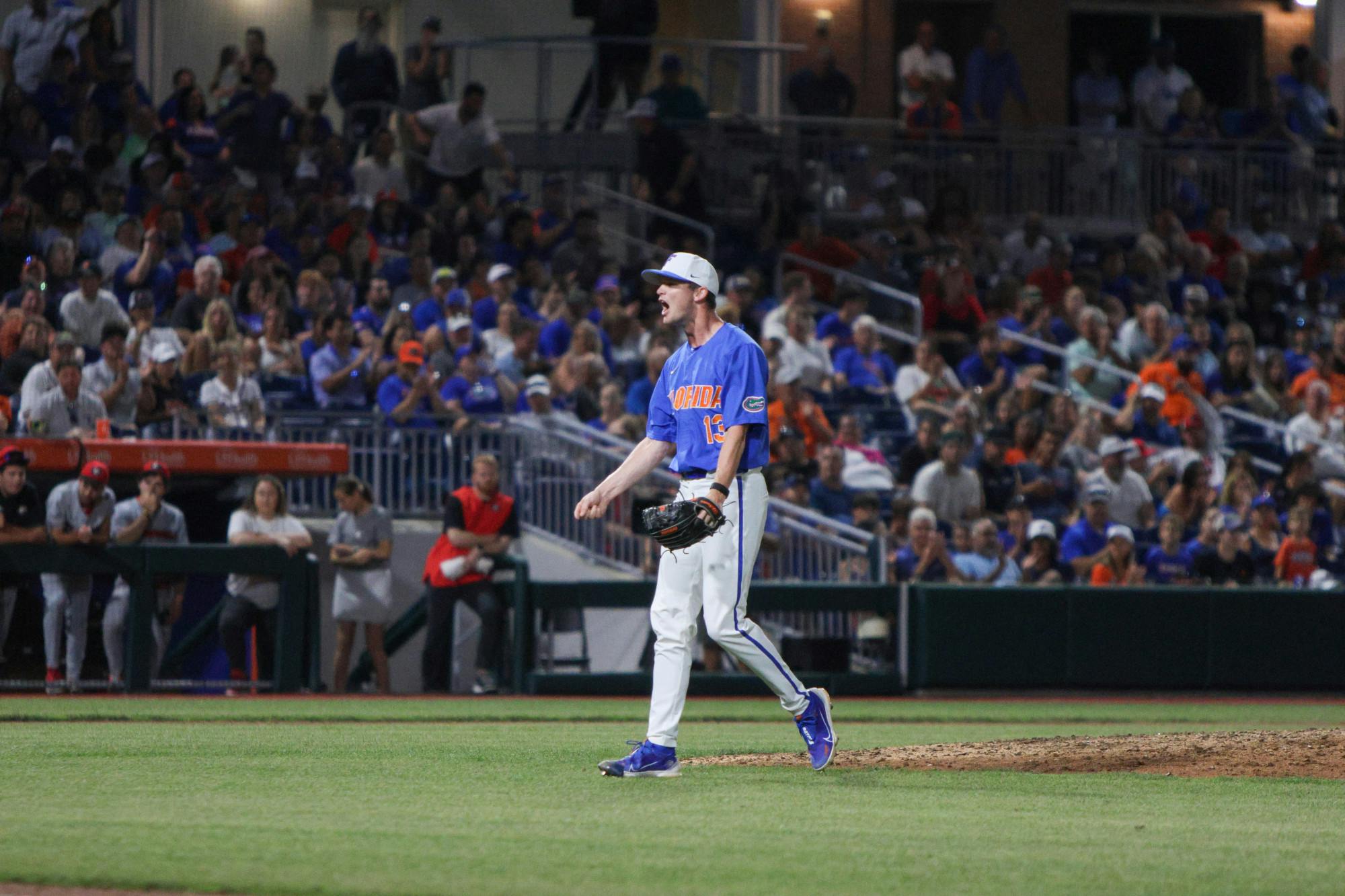 UF pitcher Ryan Slater celebrates near the mound in Florida's 2-1 win over the Georgia Bulldogs Saturday, April 15, 2023.