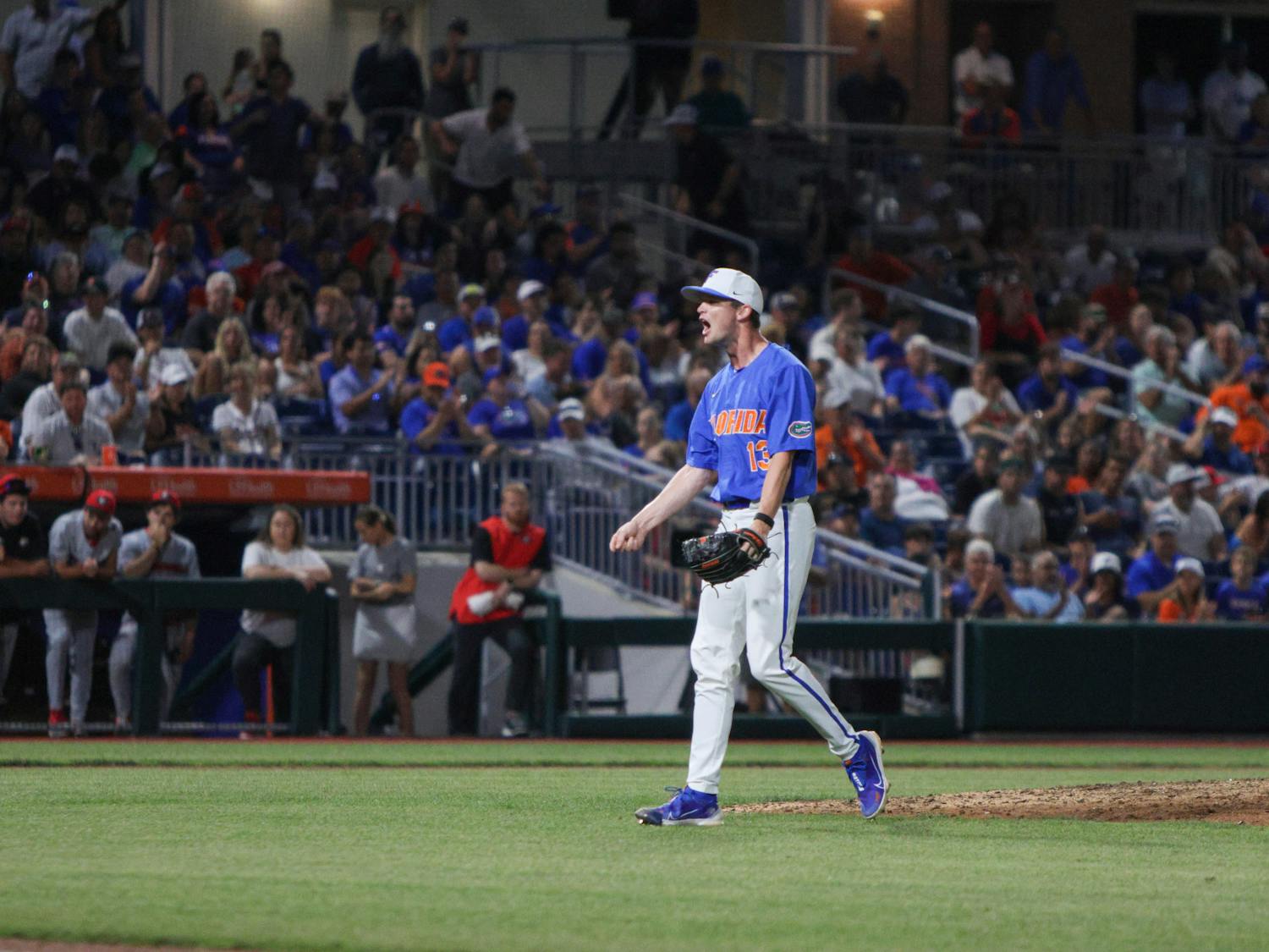 UF pitcher Ryan Slater celebrates near the mound in Florida's 2-1 win over the Georgia Bulldogs Saturday, April 15, 2023.