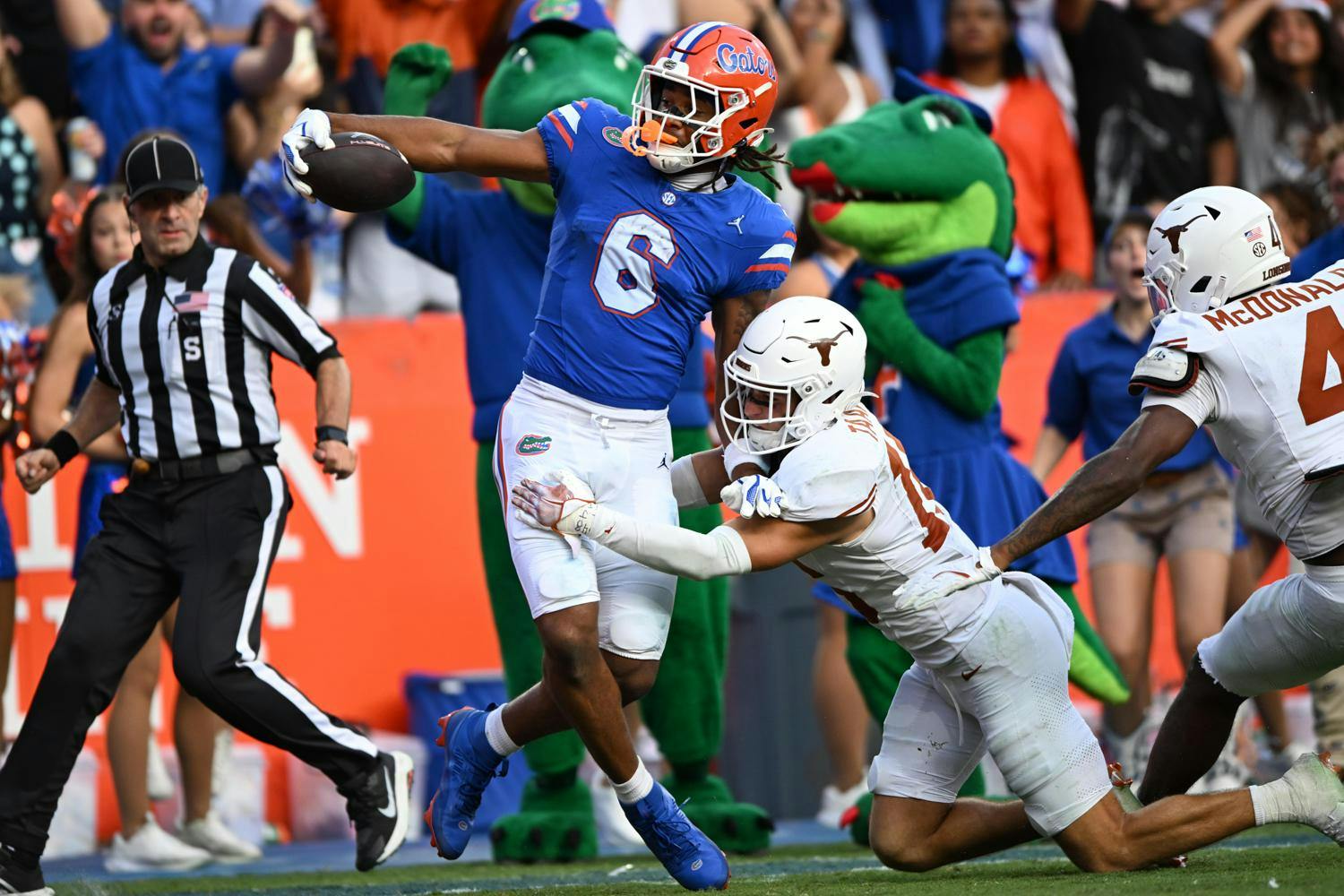 Florida Gators wide receiver Dallas Wilson (6) reaches into the end zone to score during a football game between the Texas Longhorns and the Florida Gators on Saturday, Oct. 4, 2025, at Ben Hill Griffin Stadium in Gainesville, Fla.