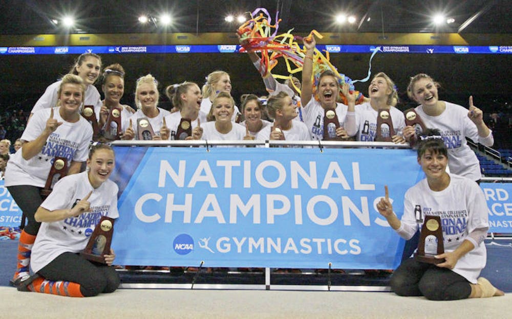 <p>Florida celebrates its victory at the NCAA Championships on April 20 in Los Angeles. The Gators became the fifth gymnastics program to win a national title.</p>