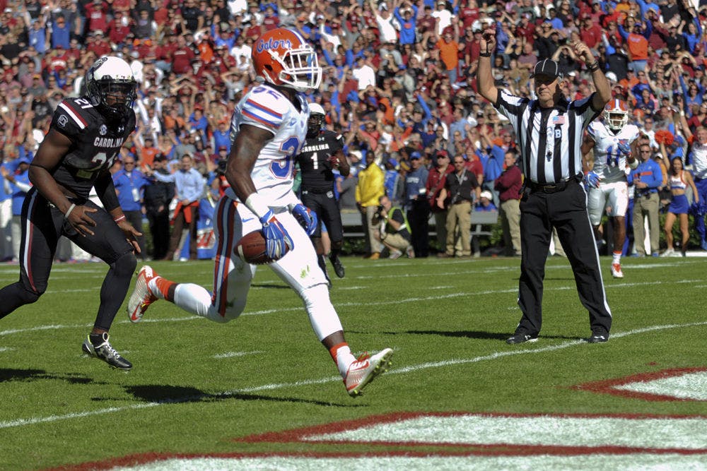 <p>Jordan Cronkrite runs into the end zone for a touchdown during Florida's 24-14 win against South Carolina on Nov. 14, 2015, at Williams-Brice Stadium in Columbia, South Carolina.</p>