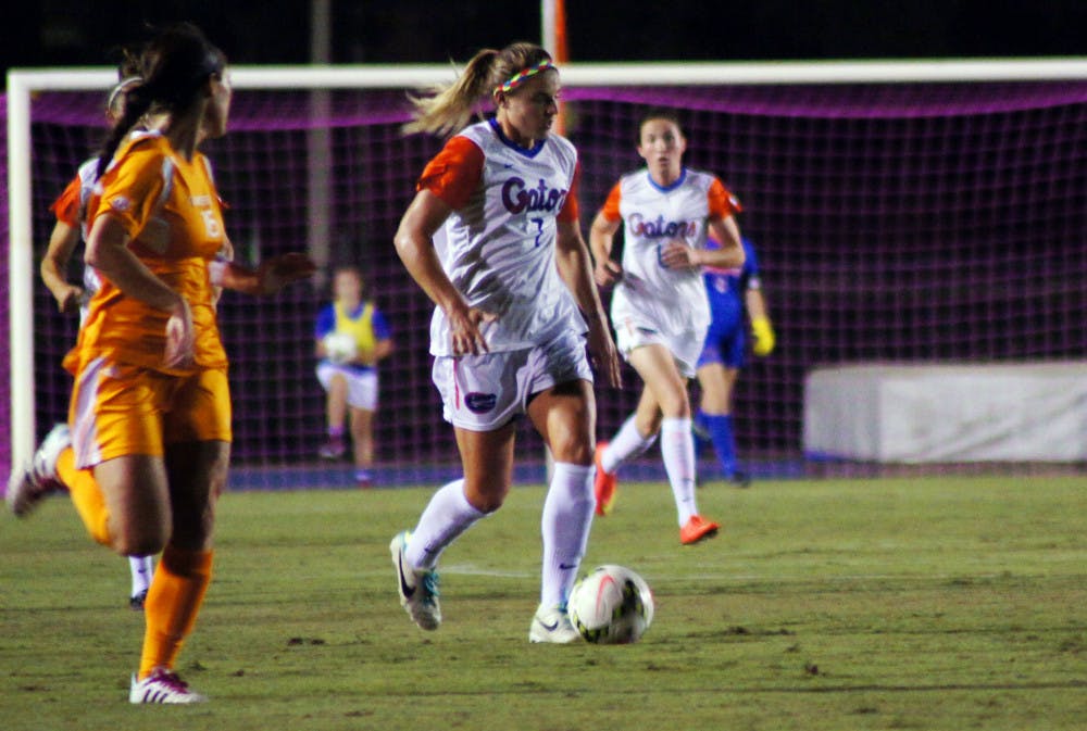 <p>Savannah Jordan dribbles the ball during Florida's 3-1 win against Tennessee on Friday at James G. Pressly Stadium.</p>