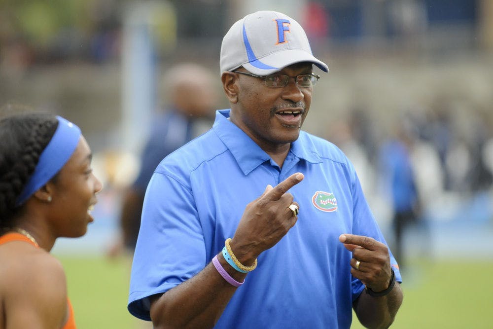 Florida track and field coach Mike Holloway addresses his team.