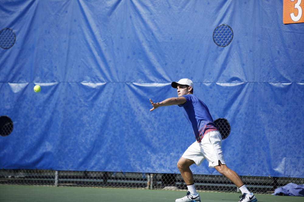 Elliott Orkin prepares to hit a forehand during Florida’s 4-2 win against UCLA on Feb. 5, 2017, at the Ring Tennis Complex.