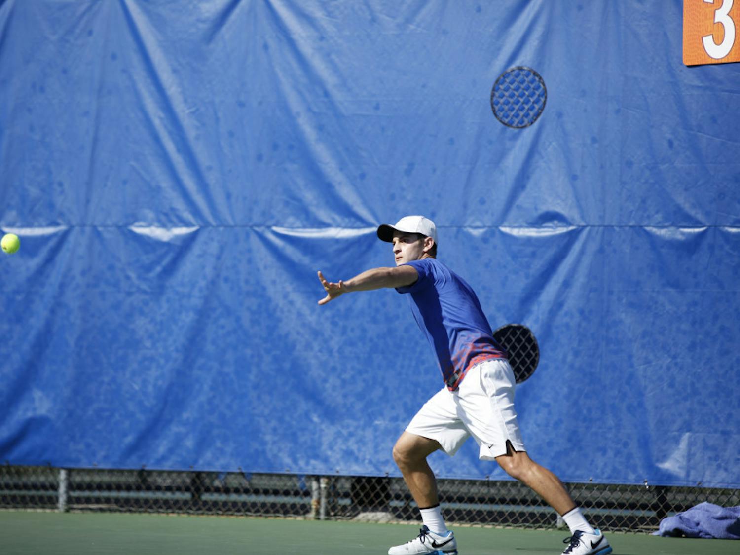 Elliott Orkin prepares to hit a forehand during Florida’s 4-2 win against UCLA on Feb. 5, 2017, at the Ring Tennis Complex.
