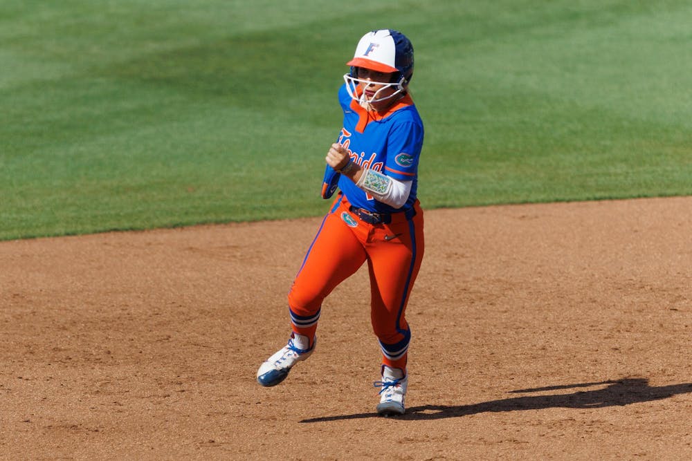 Florida right handed pitcher Allison Sparkman (16) runs towards third base during an NCAA softball game against Auburn, Saturday, April 18, 2026, in Gainesville, Fla.