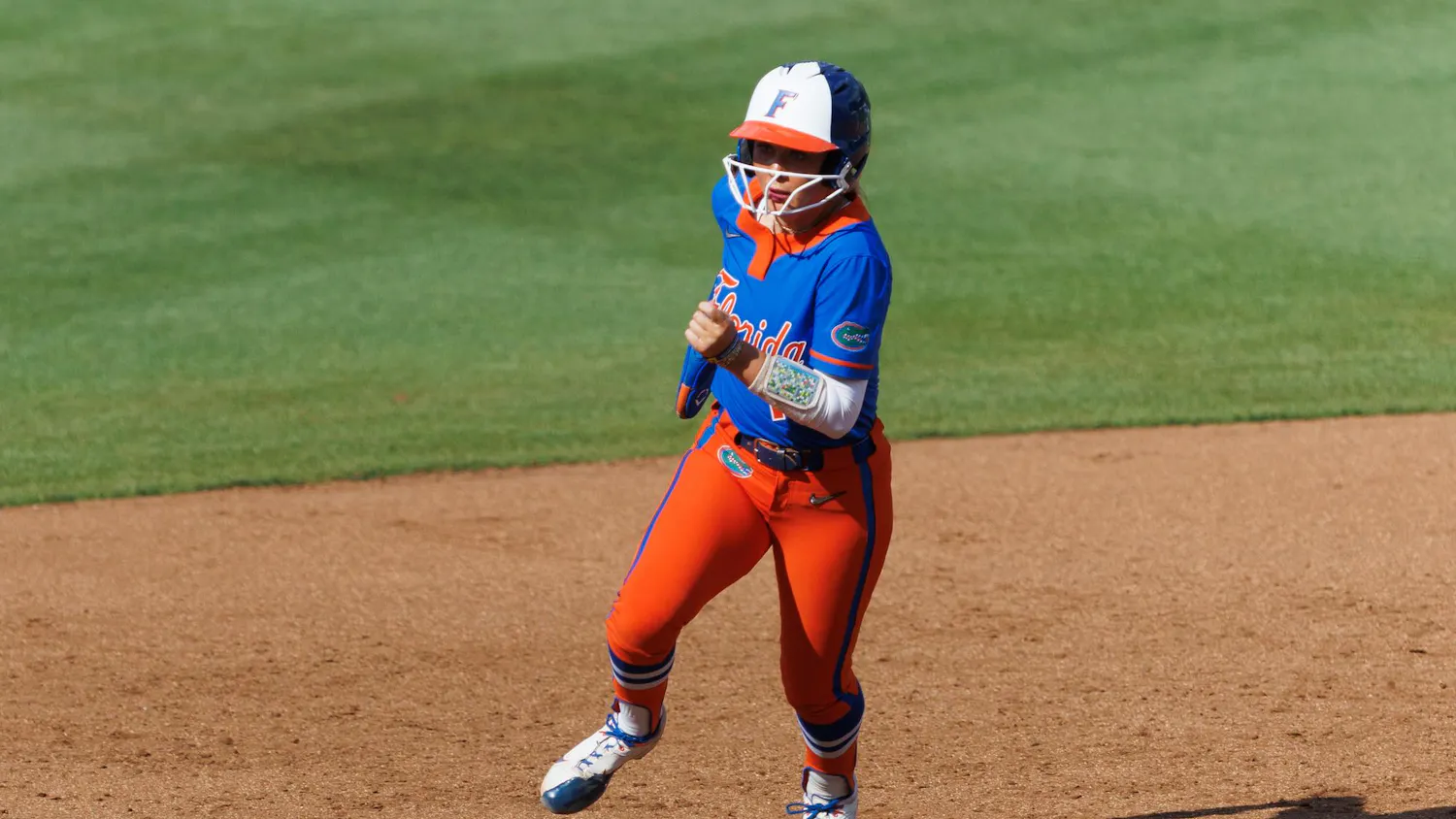 Florida right handed pitcher Allison Sparkman (16) runs towards third base during an NCAA softball game against Auburn, Saturday, April 18, 2026, in Gainesville, Fla.