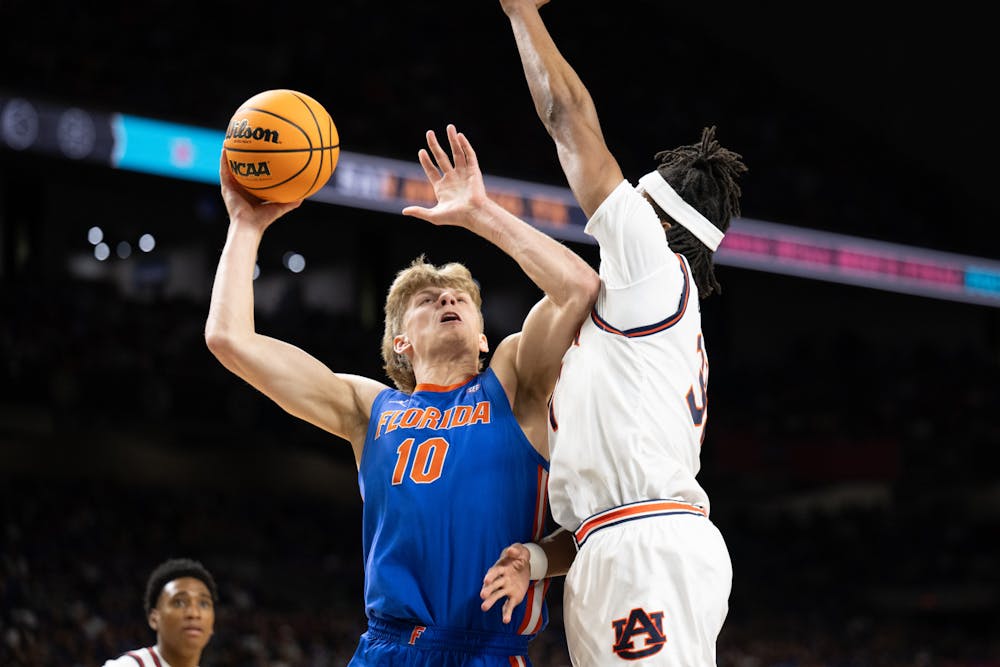Florida Gators forward Thomas Haugh (10) shoots a layup during a basketball game against the Auburn Tigers in the Final Four round of the NCAA Tournament on Saturday, April 5, 2025, in San Antonio, Texas.