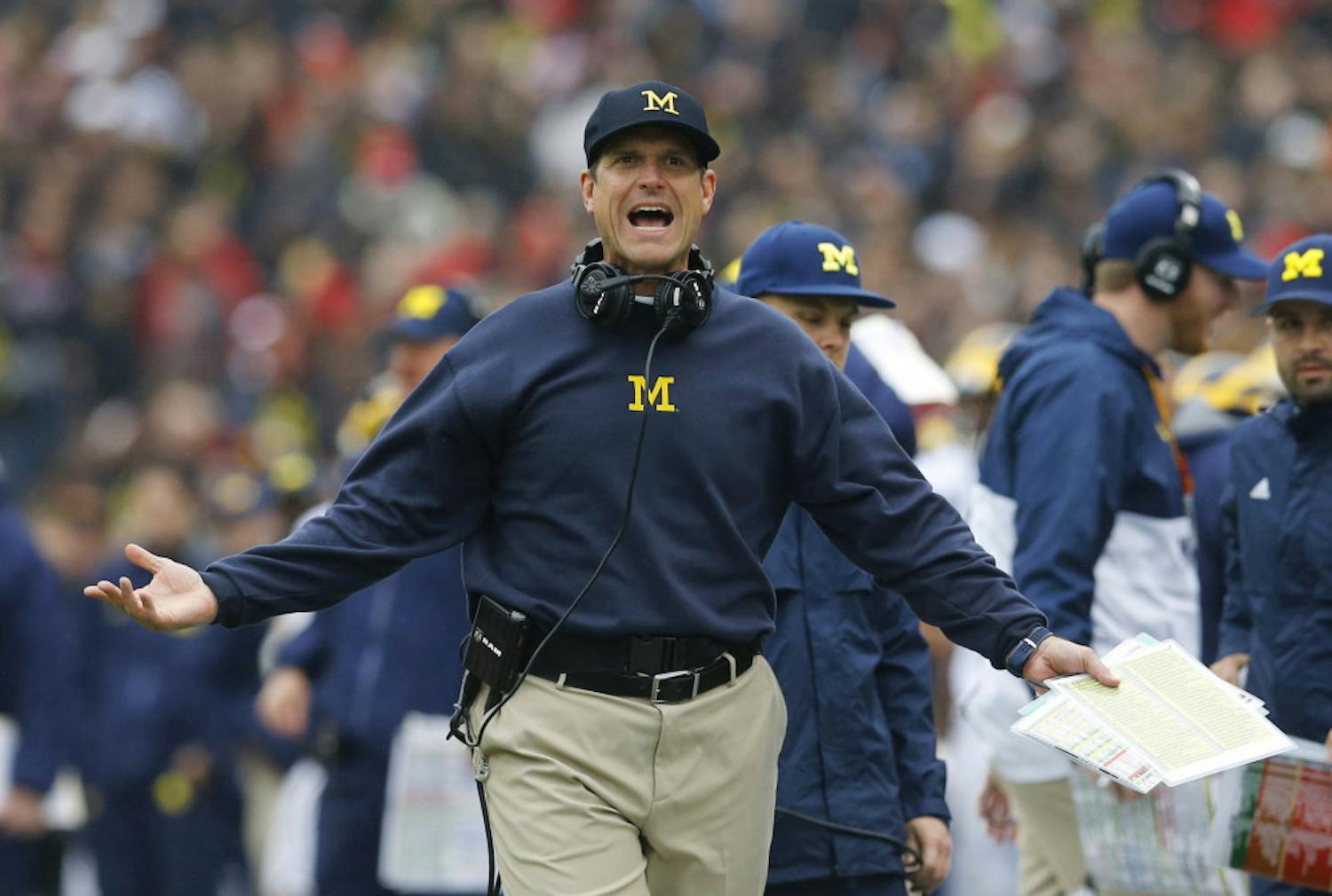 Michigan football coach Jim Harbaugh refuses to release his roster for the 2017 season. That level of paranoia makes him a perfect fit for the U.S. military.